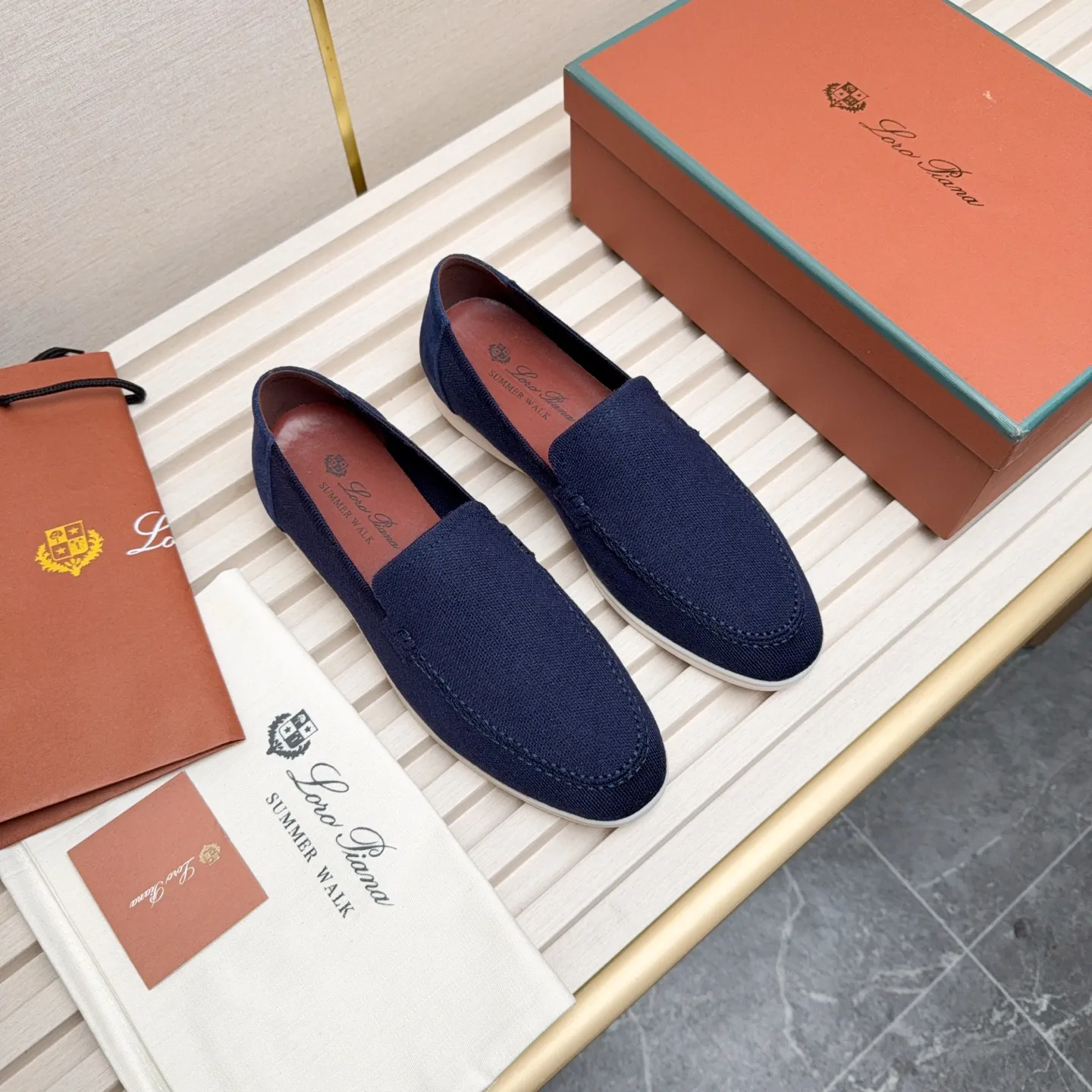 Men's Men's Shoes 💰400 Loro PIana moccasins are made of wish wool fabric. The upper is made of knitted fabric, made on a loom, and then attached to a rubber sole. The Rain System's water-repellent treatment enhances the shoe's functional design, while the suede details give the shoe a sense of elegance and sophistication. Made from Wish, fine wool from Australian and New Zealand Merino sheep